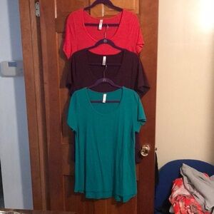 Lot of 3 Perfect T LuLaRoe shirts. One red, one purple, and one green.
